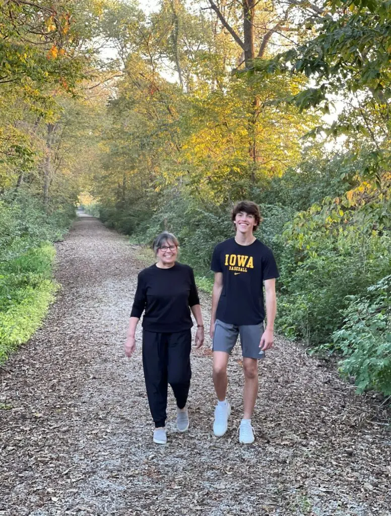 Debra and son on walk outdoors