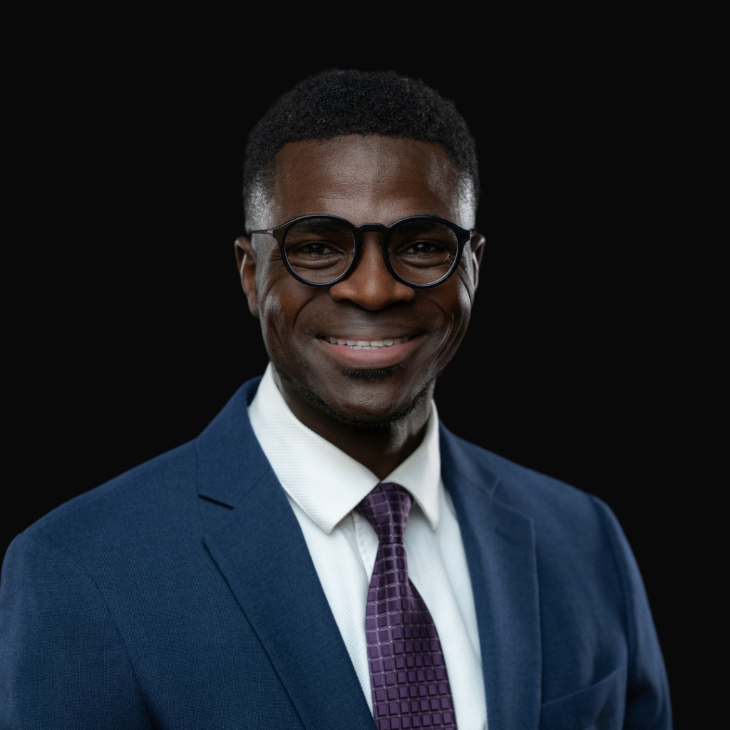 Professional headshot of Dr. Kamal Aderibigbe, orthopedic trauma surgeon at Iowa Ortho in Des Moines, IA