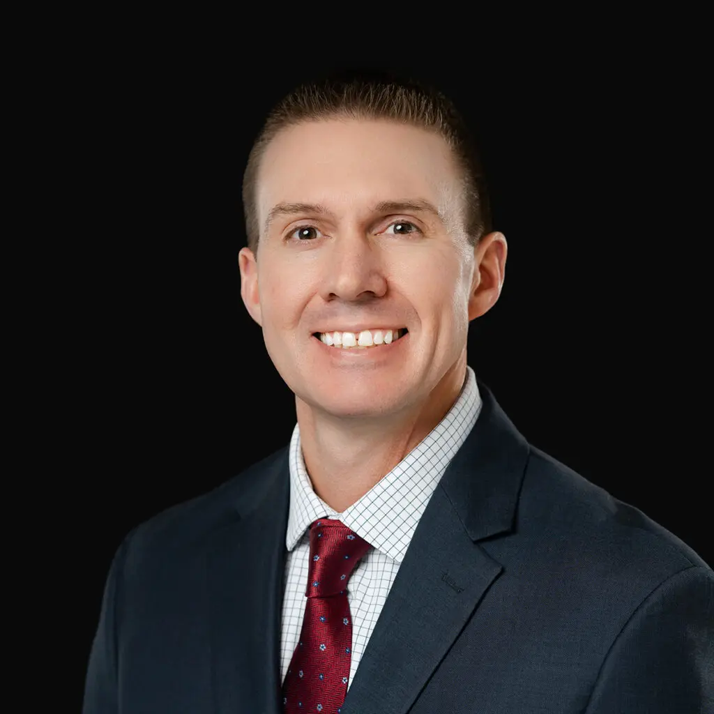 Professional headshot of Dr. Ben Beecher, orthopedic surgeon at Iowa Ortho in Des Moines, IA