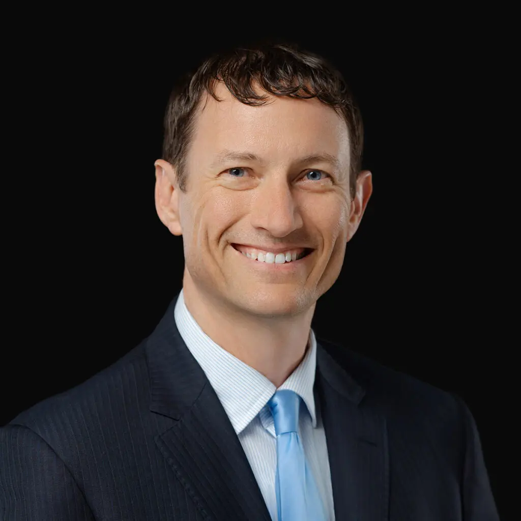 Professional headshot of Dr. Benjamin Paulson, hand surgeon at Iowa Ortho in Des Moines, IA