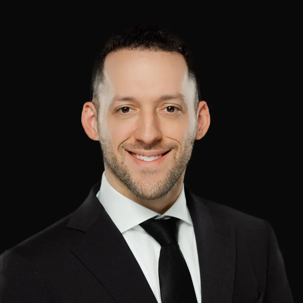 Professional headshot of Dr. Brett Rosenthal, orthopedic spine surgeon at Iowa Ortho in Des Moines, IA