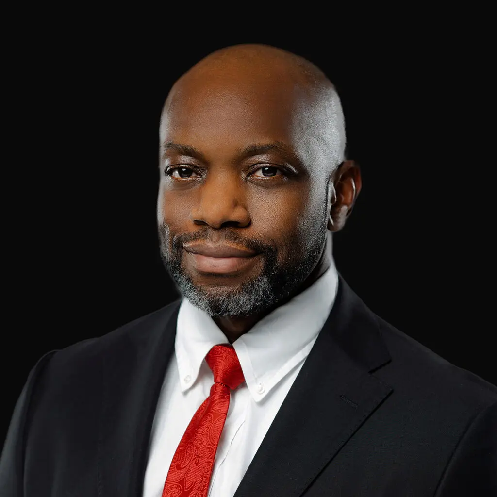 Professional headshot of Dr. Chinedu Nwosa, orthopedic trauma surgeon at Iowa Ortho in Des Moines, IA