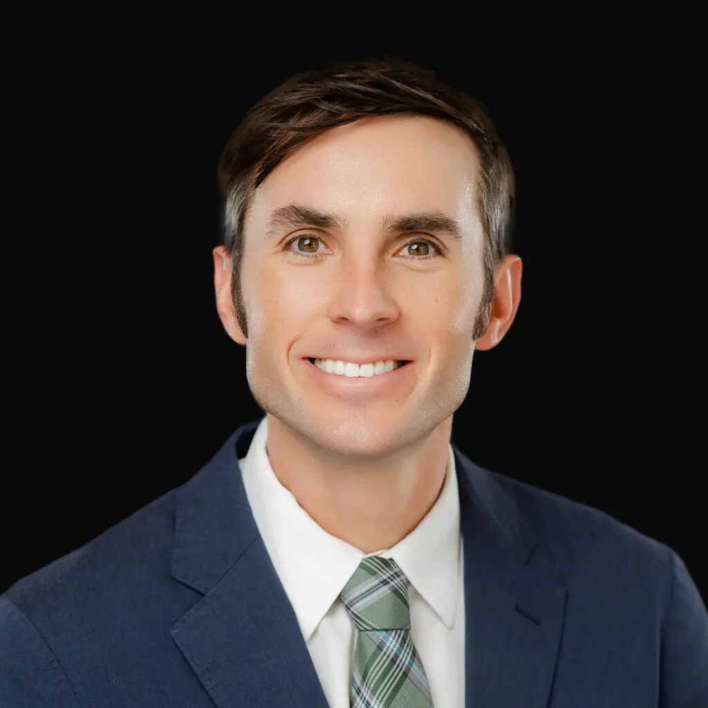 Professional headshot of Dr. John Heineman, plastic surgeon at Iowa Ortho in Des Moines, IA