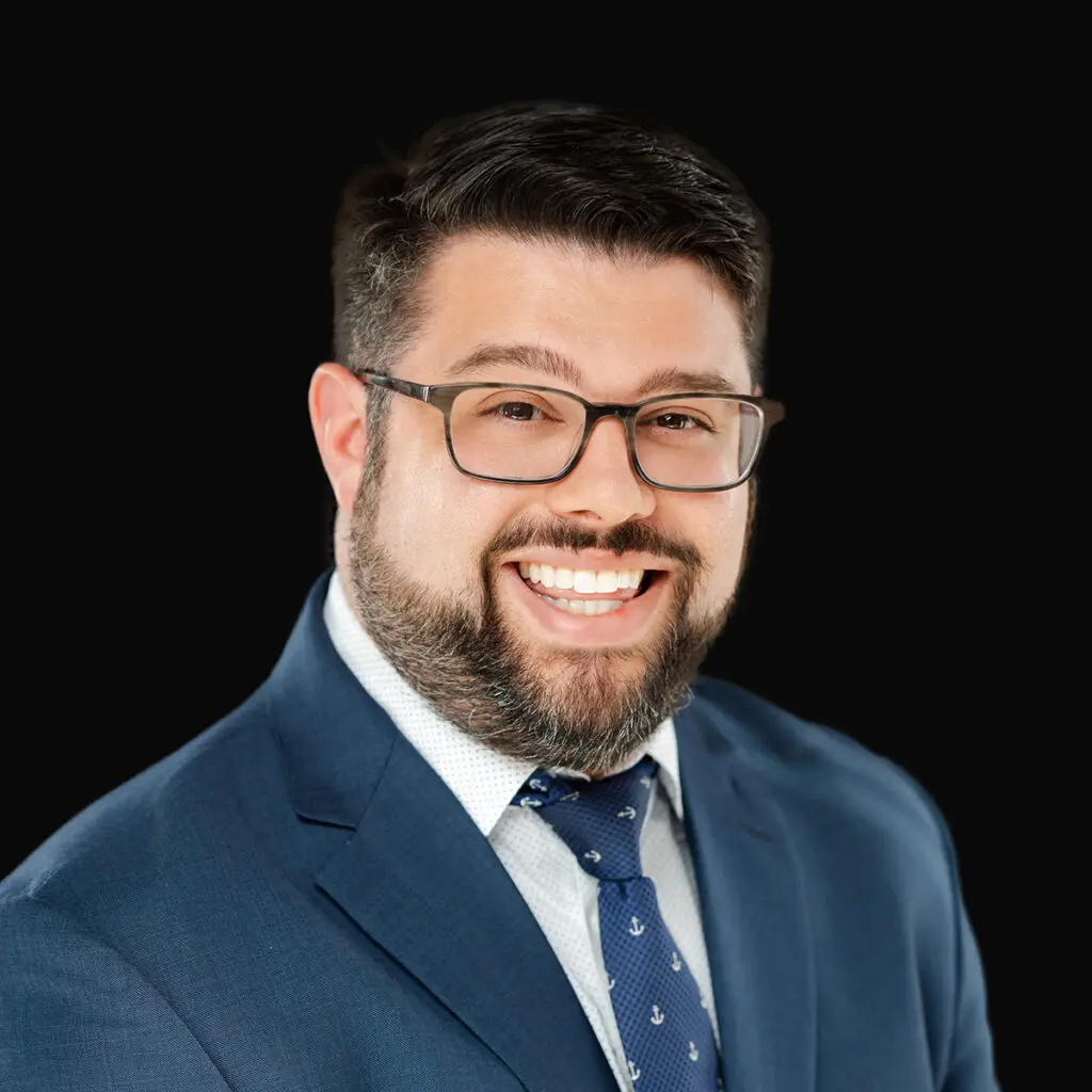 Professional headshot of Dr. Justin Khoriaty, orthopedic surgeon at Iowa Ortho in Des Moines, IA