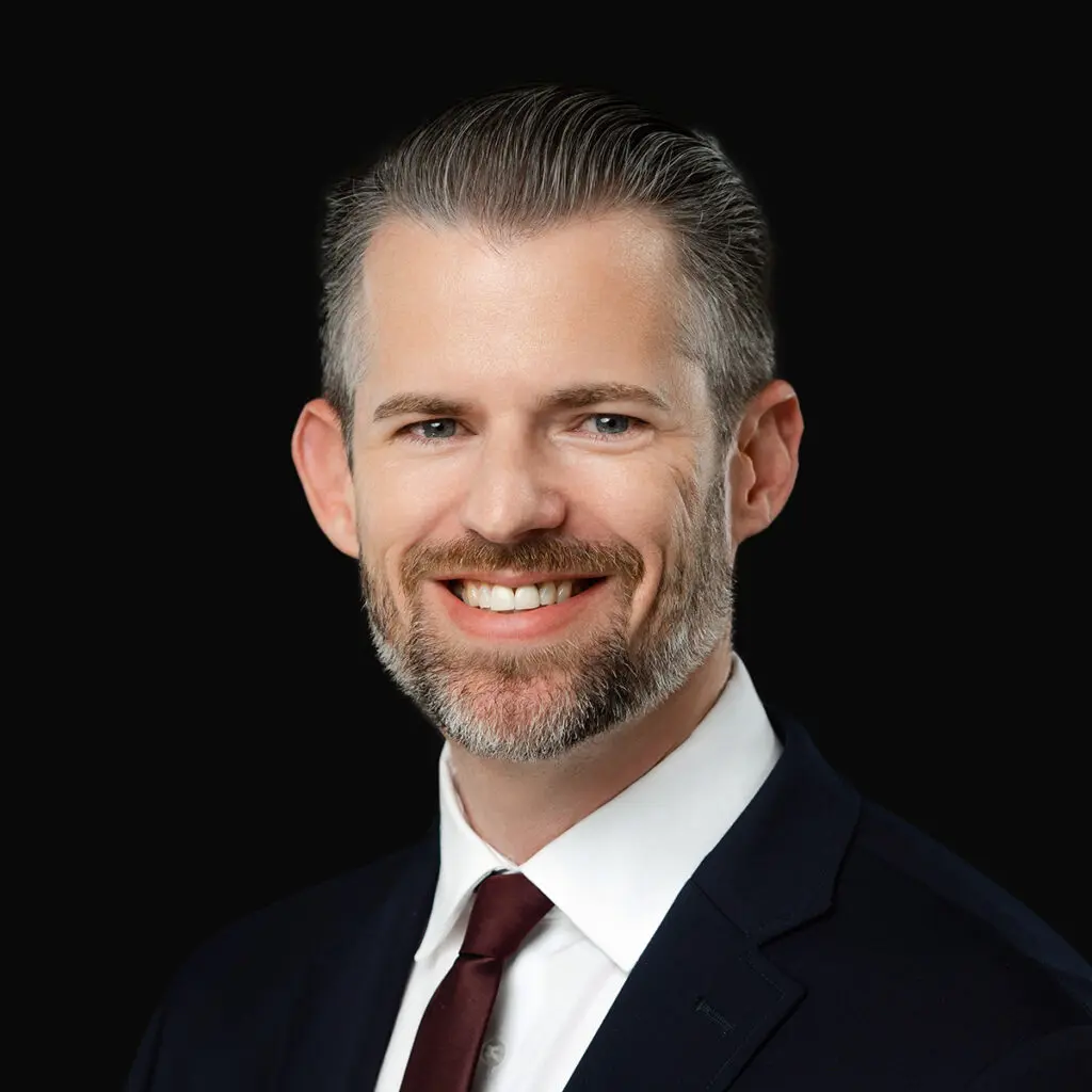 Professional headshot of Dr. J. Wesley Rayburn, pain management doctor at Iowa Ortho in Des Moines, IA