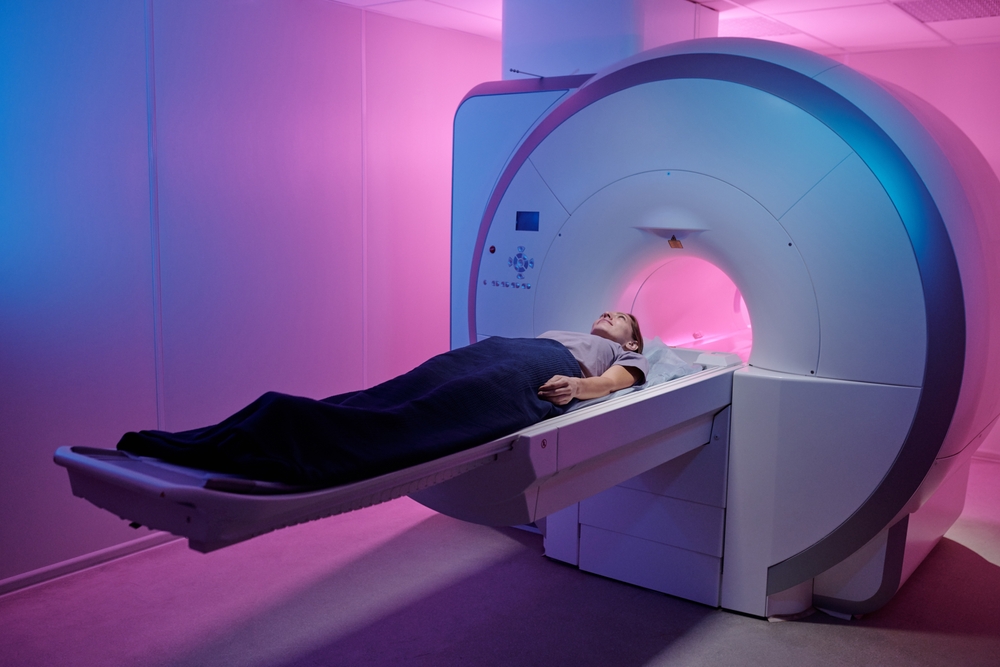 Patient receiving a CT scan at Iowa Ortho’s in-house imaging center for fast orthopedic diagnosis