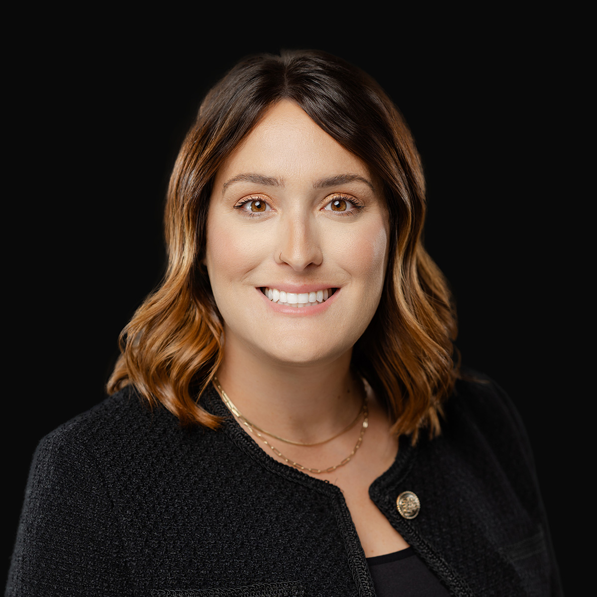 Professional headshot of physician assistant, Miranda Ayers-Burkgren