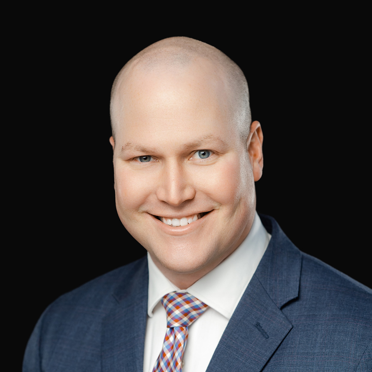 Professional headshot of Dr. Trevor Schmitz, orthopedic spine surgeon at Iowa Ortho in Des Moines IA