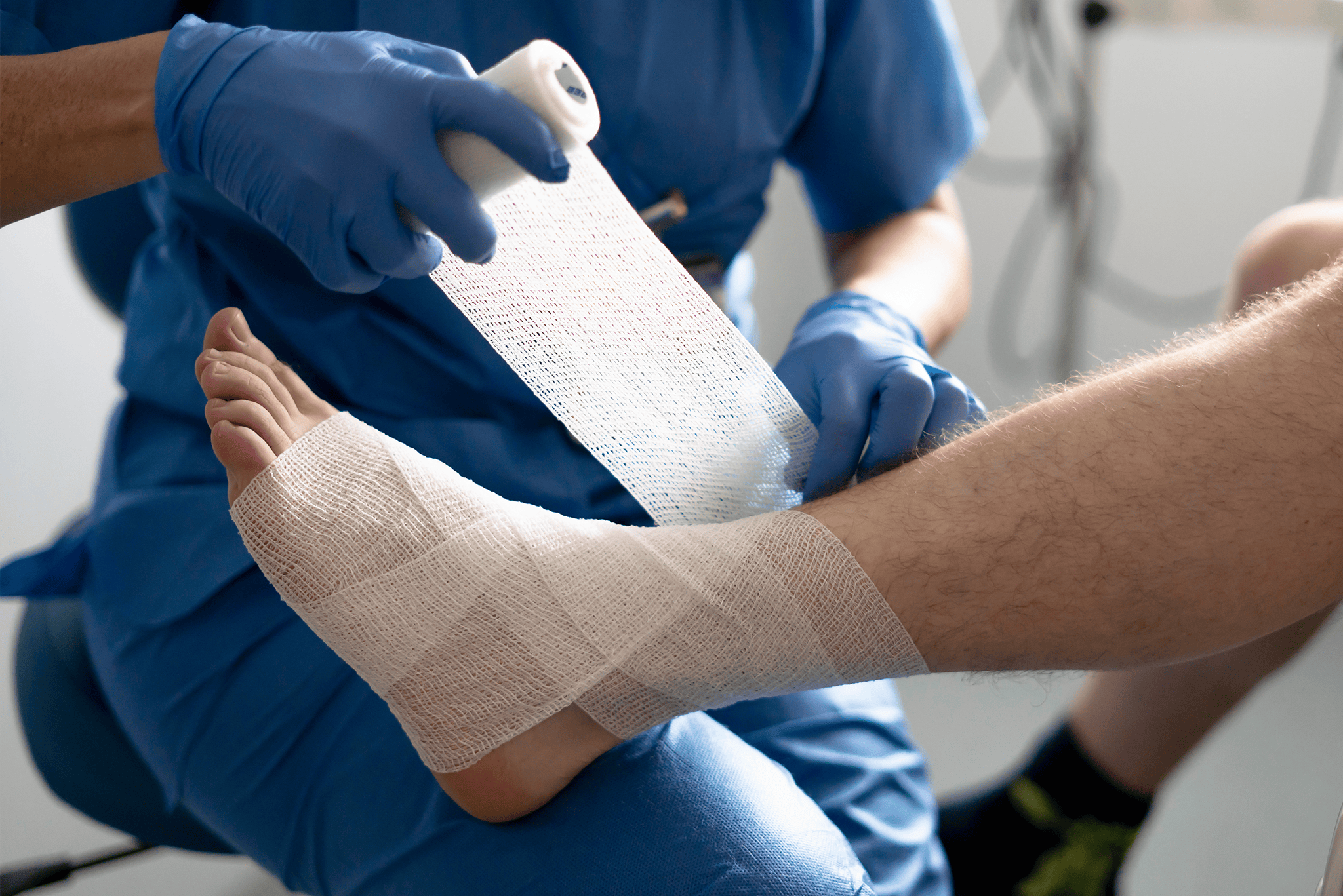Nurse Bandaging patients foot