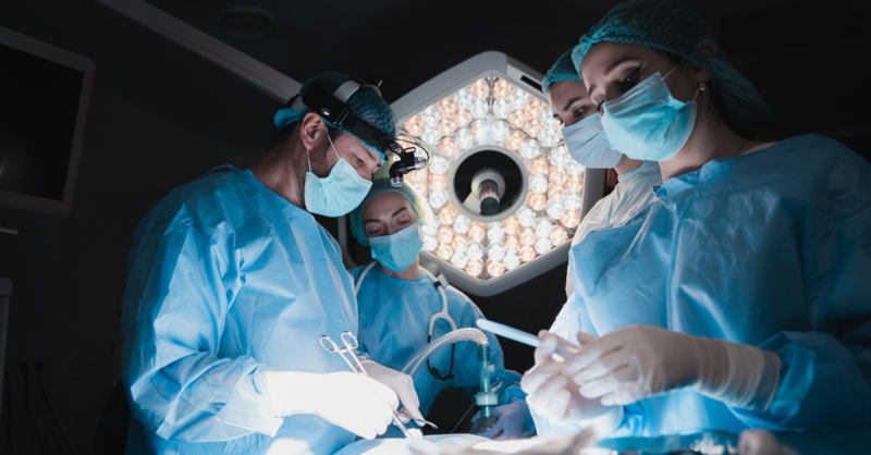 Orthopedic physician assistant assisting in surgery at Iowa Ortho